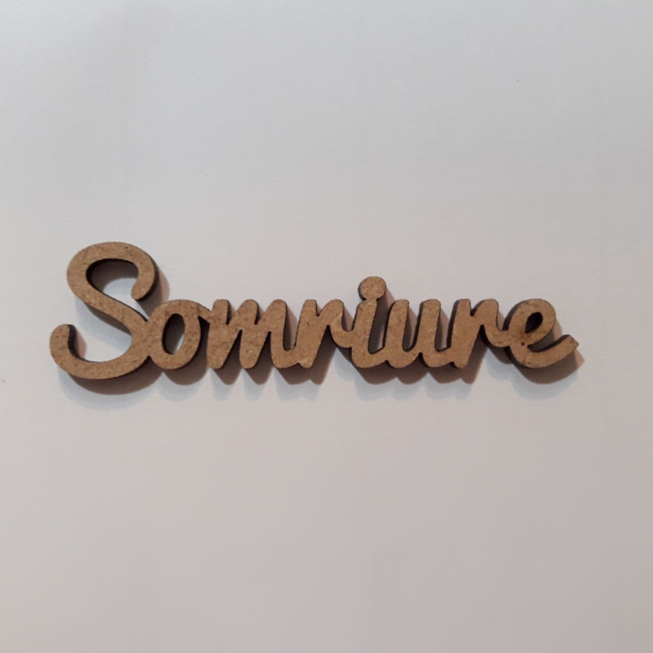 Maderita palabra Somriure