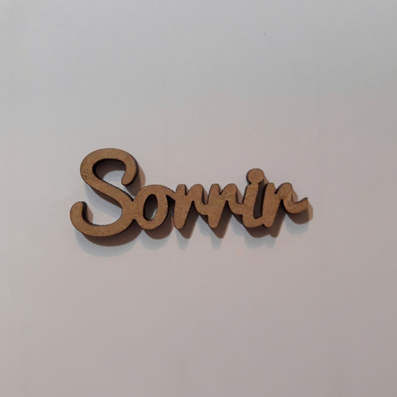 Maderita palabra Sorrir